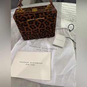 Brandon Blackwood Kendrick Trunk | Leopard Ponyhair w/ Gold Hardware